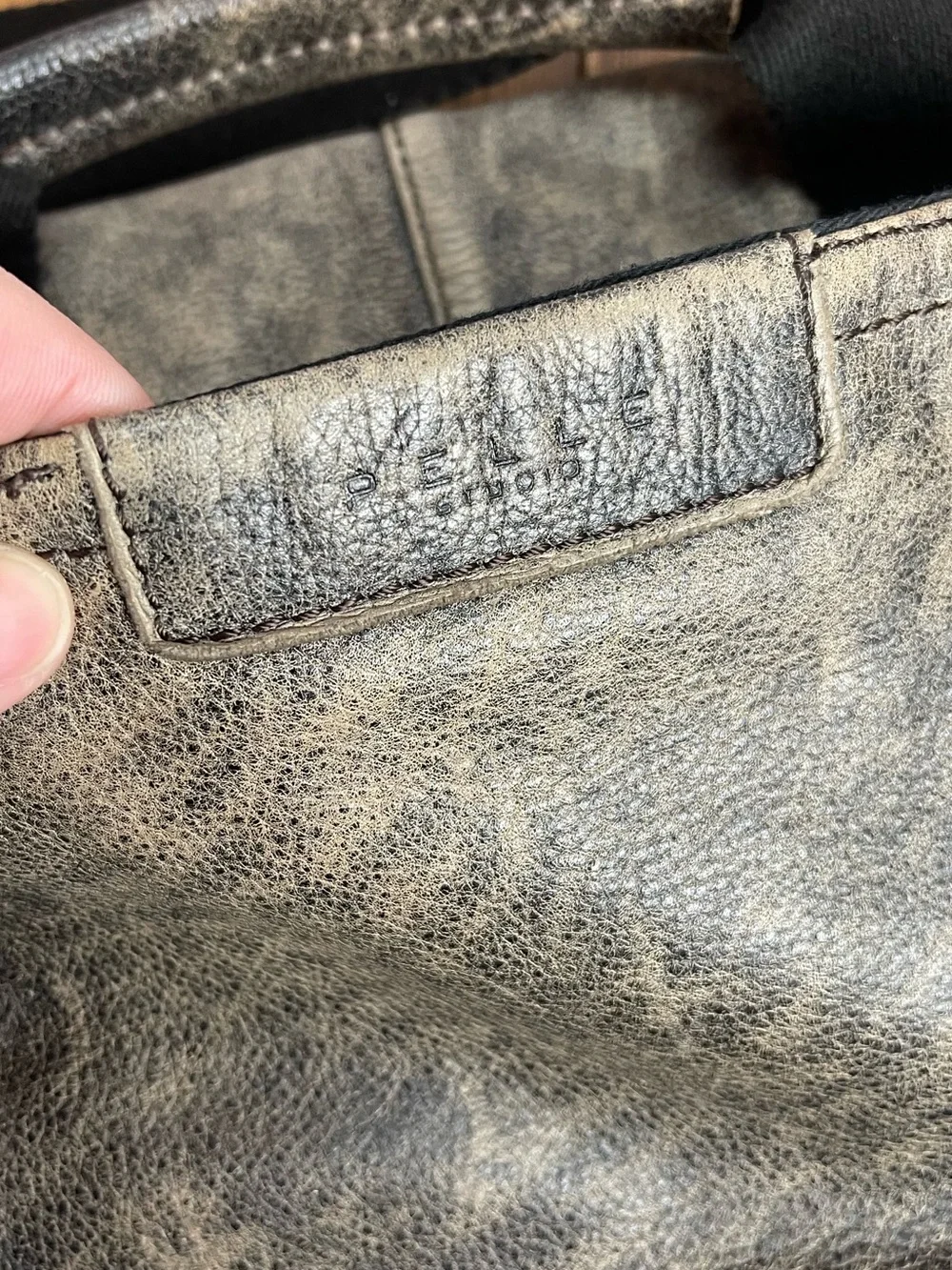 Pelle Studio black rivet distressed leather messenger bag